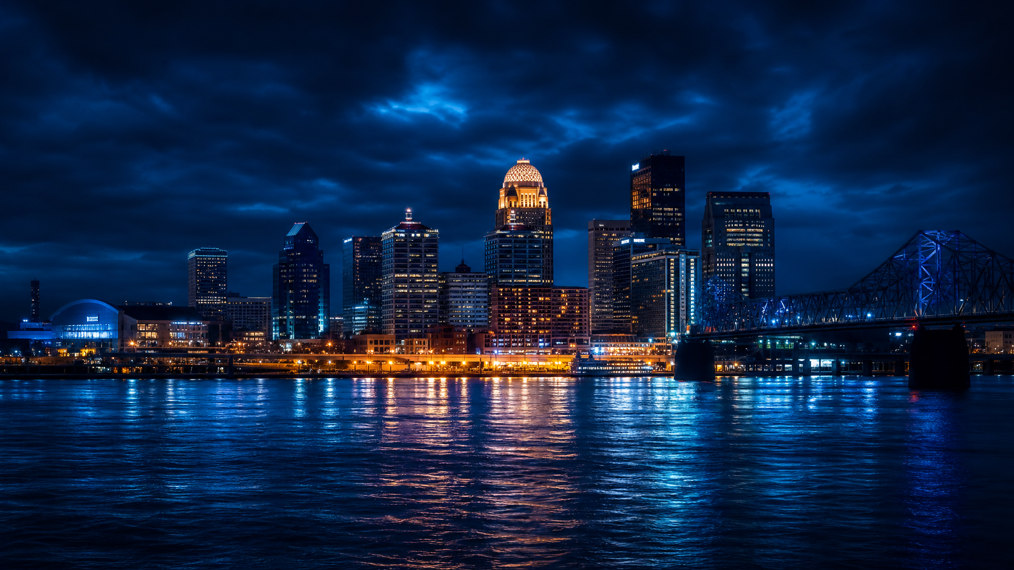 Louisville, Kentucky skyline at night over the Ohio River